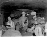 Armed Americans on a train in Assam near Japanese lines. During WWII.
