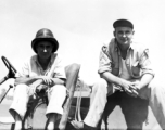 American GIs sitting on truck in the CBI, probably in Yunnan Province, China.