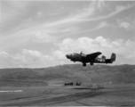 B-25 Mitchell bomber, #438, takes off from an airstrip, at Yangkai (Yangjie) air strip in Yunnan province, China.