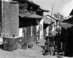 People go about their daily domestic lives in a small town in SW China during WWII.