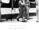 Air Force leadership in China meet to decide to blow up the US air base at Guilin in the face of the Japanese advance during Ichigo in the summer/fall 1944. General Chennault, in pith helmet, is climbing down from the C-47 transport airplane, and an unknown general is reaching out in the middle, with Casey Vincent behind, and Tex Hill, always a all man, reaches to shake hands from the right.