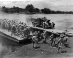 Chinese troops cross the river at Lingling by barge during retreat in the face of the Japanese Ichigo campaign advances in the summer/fall of 1944.