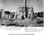 GI poses among the rubble. Bomb damage on a street corner in Liuchow (Liuzhou). The city and airfield both suffered heavily during the fighting that preceded the Japanese evacuation on June 30, 1945. A American serviceman stands in the foreground, next to a slogan that reads in Chinese, "Support Chairman Jiang", and the name of the building formerly, the "Lucky Cafe" shows on a concrete post on the right. 