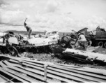 Chinese workers hack up aluminum aircraft in boneyard for American aircraft at an American airbase in Luliang, China--many of these were used as salvage for spare and repair parts for planes that were still flying, and the unusable remains apparently given away or sold locally for the metal.