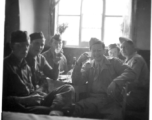 Scenes around Kunming city, Yunnan province, China, during WWII: GIs enjoy meal and drinks.