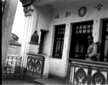 A Nationalist Chinese soldier at a Chinese military office in China during WWII.