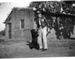 Flyer of Ringer Squadron with pet bear in the CBI during WWII.