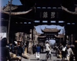 "Emerald Chicken" 碧鸡 and "Golden Horse" 金马 gates in Kunming during WWII, usually considered a pair: Golden Horse And Emerald Rooster Archway (金马碧鸡坊).  In the CBI during WWII.