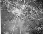 Bombing of small crossroads town, either in Burma or French Indochina. During WWII.