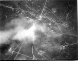 Bombing of small crossroads town, either in Burma or French Indochina. During WWII.