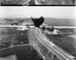 Bombing on a small rail bridge in French Indochina (Vietnam), during WWII.