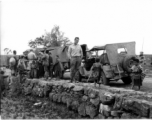 A convoy of mud-covered Jeeps in southern China.