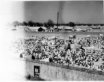 Busy market scene.  Scenes in India witnessed by American GIs during WWII. For many Americans of that era, with their limited experience traveling, the everyday sights and sounds overseas were new, intriguing, and photo worthy.