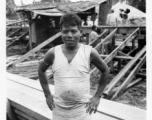 Local people in Burma near the 797th Engineer Forestry Company--A local worker or contract employee at the GI sawmill in Burma.  During WWII.