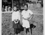 Kachin boy and girl in Burma.  Near the 797th Engineer Forestry Company.  During WWII.