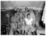 Engineers of the 797th Engineer Forestry Company pose in their barracks/tent in Burma.  During WWII.