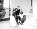 ​ An image of Frank G. Ehle at the Nanjing (Nanking) Middle School on December 5th, 1945, with "Shamamee" and "Shahaitsa" (both not names but rather actually just transliterations of "little sister" and "little child" in Chinese)."   Frank G. Ehle and his wife in later years. These images were part of a small subset among the images collected by the editors of Ex-CBI Roundup (usually through reader submission) over many years of publication, and shared with the Remembering Shared Honor project.  ​