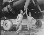 Men of 330th Troop Carrier, 9th CC, stand with C-46 transport.   The writing on the back of this picture indicates the person on the left is Dave Sobel, with Arnold Wall on the right (on different pictures gives a name Milt Sobel. However, Milt Sobel is closer in height to Arnold, and Milt also commonly has a cigarette in his left hand).   From the collection of Arnold Wall. (Much appreciation to son D. W.)