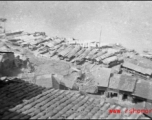 Boats clustered on the Yellow River during WWII, possibly in or near Lanzhou.