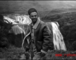 Jose Martinez, airplane mechanic with the 396th, standing in front of the Huangguoshu waterfall in Guizhou (Kweichow) province, China.   Image courtesy of Elmer Bukey.