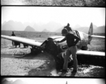 An American P-40 down in Guilin, China, during WWII.  From the collection of Hal Geer.