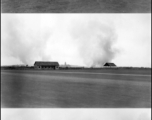 The facilities at the Hengyang airbase burn as the allies retreat in the face of the Japanese advance in the fall of 1944.  From the collection of Hal Geer.
