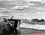 Rigging a bridge with explosives at Liuzhou before the Japanese advance during Ichigo in the fall of 1944.