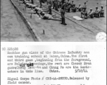 Machine gun class of the Chinese Infantry non com training school at Dutan, China.  The first and third guns, beginning from the foreground, are Belgian Brownings, the rest are Chezck Bren guns.  Chang Tson-ta and Chung Fo are the instructors in this line. China. 18 May 1944