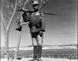 A Chinese soldier keeping guard at an American base, somewhere in China.