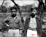 Two young Chinese men in China, most likely on an American base where they work as staff. During WWII.