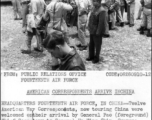 Twelve American War Correspondents, now touring China, were welcomed on their arrival by General Pao (foreground), Chief Secretary to General Ho Ying Chin, Supreme Commander of the Chinese Army.