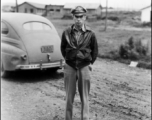 An American serviceman in the CBI with a sedan car.  From the collection of Wozniak, combat photographer for the 491st Bomb Squadron, in the CBI.