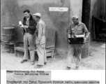 Fourteenth Air Force Transport Section radio operators outside their palatial Static Plaza, or in plain words, radio shack.