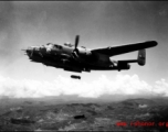 A B-25J of the 491st Bomb Squadron, drops bombs on a target somewhere in SW China or Burma. Named "Niagra's Belle", the squadron assigned combat id number '439' is visible on the tail and on the nose.