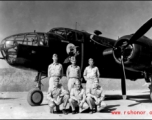 Unidentified aircrew members of the 491st Bombardment Squadron at Chakulia AB, India. The Squadron's early emblem (1942-43) representing "The Bomb Jockeys" shows clearly on the side of the B-25C. The insigne was not officially accepted. Late in 1943, their "Ringers Squadron" moto and emblem were accepted.  (Information courtesy of Tony Strotman)