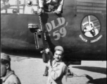 Eugene Montgomery passes a .50 cal machine gun up to Lloyd Kershaw, leaning out of the "green house" at Yangkai Airbase, China, in March 1944. They were preparing "Old '59'" for the beginning of its trip back to the USA where the the war weary B-25 and its original crew, from the 491st "Ringer Squadron" would tour on a War Bond drive.