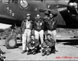 An air crew of the 491st Bomb Squadron pose in the revetment with B-25J #439, "Niagra's Belle", at Yangkai, China. Sitting are T/Sgt Henry P. Albro (radio) and S/Sgt Arquimidas L. Matos (gunner). Standing are (l-r) Lt. Seymour Mazer (navigator), Lt. Eric M. Hexburg (pilot) and S/Sgt Frank A. Koncolics (flight engineer).