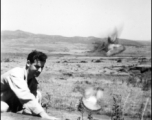 An American releasing pigeons somewhere in the vicinity of Yangkai Air Base, Yunnan Province, China.