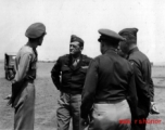Col. Clark (far left) and Claire Chennault (middle) at Yangkai, February, 1945, during decoration formation.