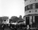 Local people on a street and market in in Kunming city, Yunnan province, China.