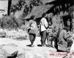 Local people in a village in China, probably Yangkai village, Yunnan province.