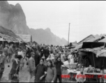 A bustling street at Liuzhou to the south of the river, near the American air base in WWII.  From the collection of Hal Geer.