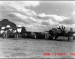 Refueling aircraft, B-25 on the right and B-24 on the left, at Liuzhou or Guilin, in Guangxi.  From the collection of Hal Geer.