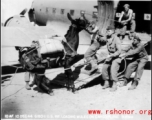 10AF 10Dec44 G180-1 U.S., Infantry loading mules on [C-47] cargo plane, Burma.