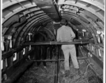 A mule loaded for transit aboard American C-47 transport plane, Burma, 10AF, 10Dec44.