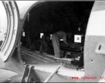 10AF 10Dec44 Preparing to load mules on [C-47] cargo plane, Burma, during WWII.