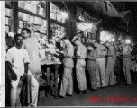 GIs lined up at magazine stand in Calcutta during WWII.