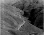 Lonely, winding section of Burma Road near the Salween River in southwest China, during WWII.  Photo by George Pollock.