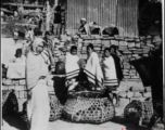 Naga tribe women at a native bazaar in Burma. In the CBI.