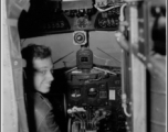 John Bondurant at the controls of a US military plane during WWII in the CBI.  Photo from John Bondurant.